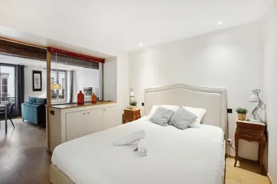 Un ou plusieurs lits dans un hébergement de l'établissement BnBNova - 1BR Mabillon & Saint Germain