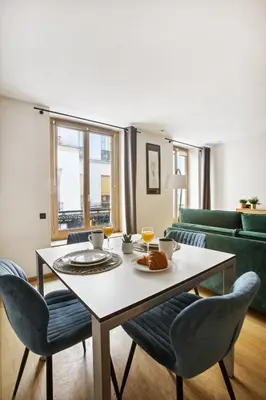 Coin salon dans l'établissement BnBNova - 1BR Mabillon & Saint Germain