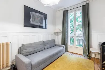 Coin salon dans l'établissement GuestReady - Charm & comfort near Parc des Princes