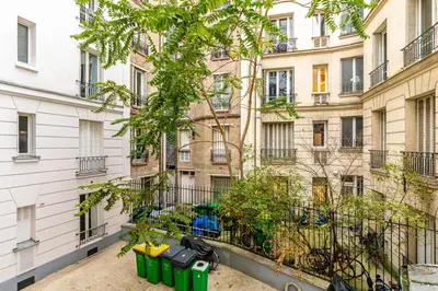 Jardin de l'établissement GuestReady - Charm & comfort near Parc des Princes