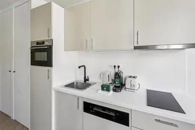 Cuisine ou kitchenette dans l'établissement Lavie Maison Luminous Appartement near Montmartre