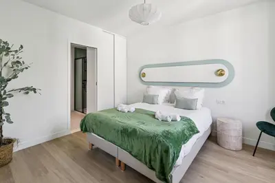 Un ou plusieurs lits dans un hébergement de l'établissement Lavie Maison Luminous Appartement near Montmartre
