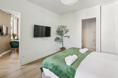 Un ou plusieurs lits dans un hébergement de l'établissement Lavie Maison Luminous Appartement near Montmartre