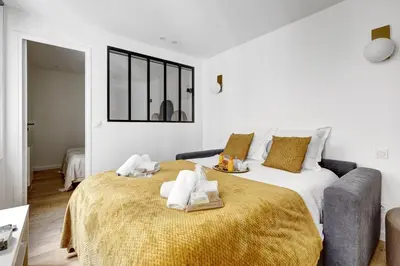 Un ou plusieurs lits dans un hébergement de l'établissement TBS 342 - Superb apartment in heart of Paris 2