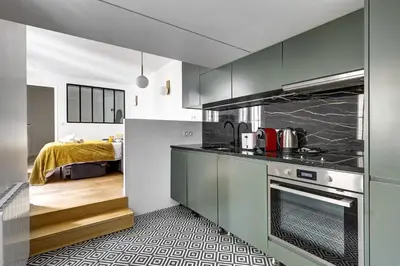 Cuisine ou kitchenette dans l'établissement TBS 342 - Superb apartment in heart of Paris 2