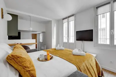 Un ou plusieurs lits dans un hébergement de l'établissement TBS 342 - Superb apartment in heart of Paris 2