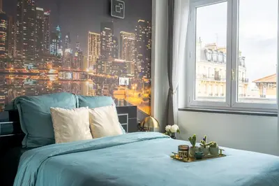 Un ou plusieurs lits dans un hébergement de l'établissement Paris Homestay of Dreams