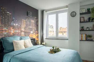 Un ou plusieurs lits dans un hébergement de l'établissement Paris Homestay of Dreams