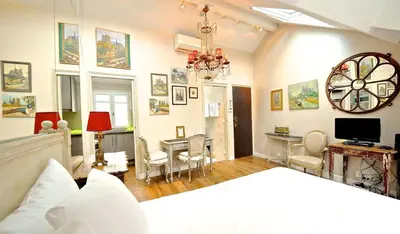 Télévision ou salle de divertissement dans l'établissement A Penthouse Balcony Esmeralda