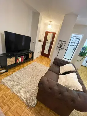 Télévision ou salle de divertissement dans l'établissement Le Séquoia d'Ana