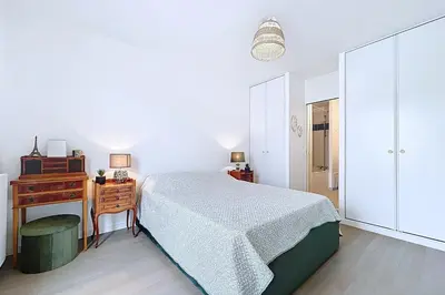 Un ou plusieurs lits dans un hébergement de l'établissement Apartment with terrace 100m from Paris