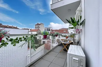 Balcon ou terrasse dans l'établissement Apartment with terrace 100m from Paris