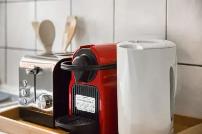 Cuisine ou kitchenette dans l'établissement Appartement - Beau séjour lumineux - RER C-METRO 13 & 14