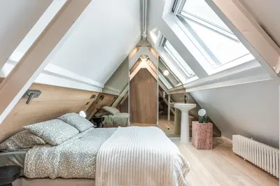 Un ou plusieurs lits dans un hébergement de l'établissement Luxury duplex - Louvre Museum - 6 guests