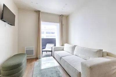 Coin salon dans l'établissement Appartement de charme au coeur d'Alesia