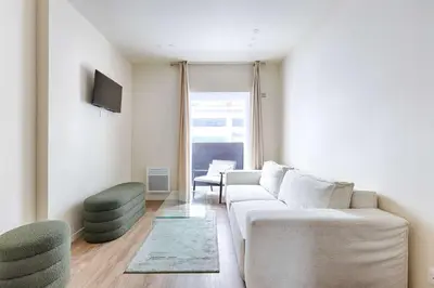 Coin salon dans l'établissement Appartement de charme au coeur d'Alesia