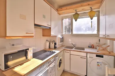Cuisine ou kitchenette dans l'établissement Le Mozart - 16e arrondissement