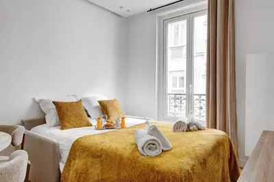 Un ou plusieurs lits dans un hébergement de l'établissement 520 Suite Débarcadère - Lovely Apt Paris 17th