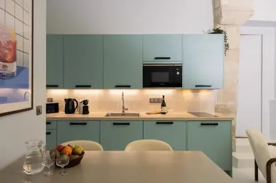Cuisine ou kitchenette dans l'établissement Notre Dame Paris Suite