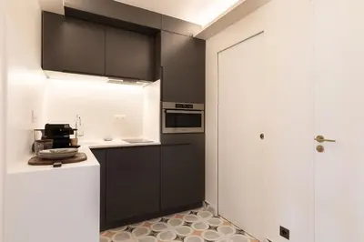 Cuisine ou kitchenette dans l'établissement Collection Molière - appartements