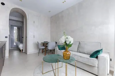 Coin salon dans l'établissement Appartement de charme Belfort