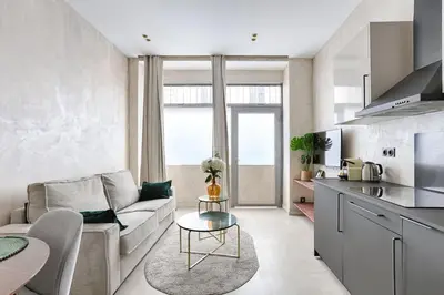 Cuisine ou kitchenette dans l'établissement Appartement de charme Belfort