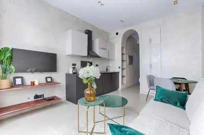 Télévision ou salle de divertissement dans l'établissement Appartement de charme Belfort