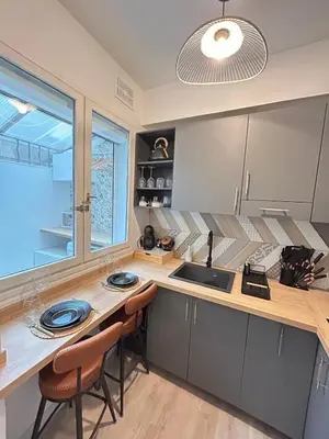 Cuisine ou kitchenette dans l'établissement Le Cocon