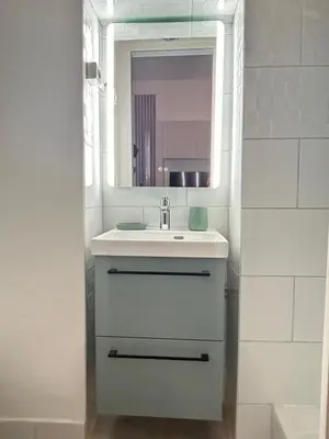 Salle de bains dans l'établissement Le Cocon