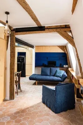 Coin salon dans l'établissement Le Saint Claude - Studio dans le Marais