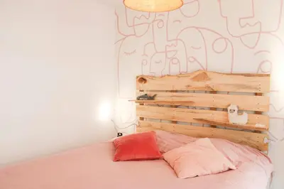 Un ou plusieurs lits dans un hébergement de l'établissement Bright apartment in the heart of Paris