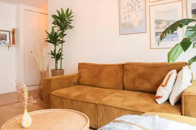 Coin salon dans l'établissement Bright apartment in the heart of Paris