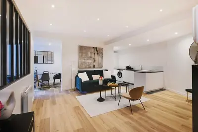 Coin salon dans l'établissement Magnifique Appartement 3BR 8P Nation