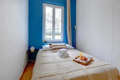 Un ou plusieurs lits dans un hébergement de l'établissement BnBNova - 2BR - Le Marais & Montorgueil