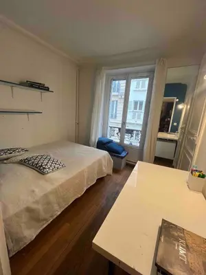 Un ou plusieurs lits dans un hébergement de l'établissement Eiffel Tower 4P apartment - Passy - quiet -