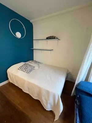Un ou plusieurs lits dans un hébergement de l'établissement Eiffel Tower 4P apartment - Passy - quiet -