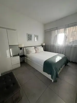 Un ou plusieurs lits dans un hébergement de l'établissement Lovely and Spacious apartment