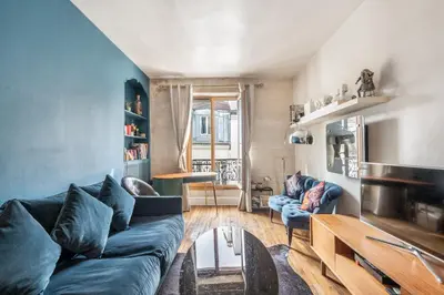 Coin salon dans l'établissement Rosiers - Magnifique appartement au centre du Marais
