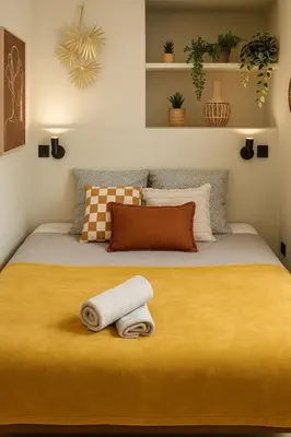 Un ou plusieurs lits dans un hébergement de l'établissement CasaHome - Cozy apartment in central Paris