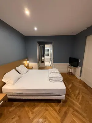 Un ou plusieurs lits dans un hébergement de l'établissement Standing Apartment - Champs Élysée