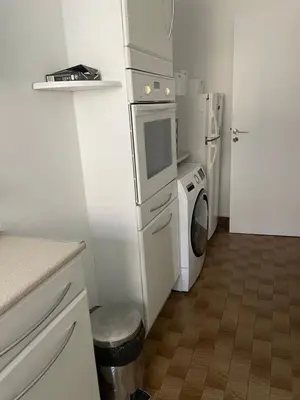Cuisine ou kitchenette dans l'établissement Typical French Appt for 4 near Eiffel tower