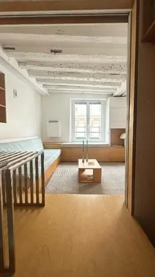 Un ou plusieurs lits dans un hébergement de l'établissement Peaceful flat in Central Paris