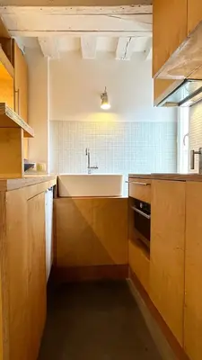 Cuisine ou kitchenette dans l'établissement Peaceful flat in Central Paris