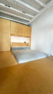 Un ou plusieurs lits dans un hébergement de l'établissement Peaceful flat in Central Paris
