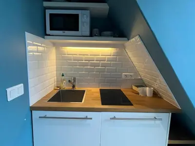 Cuisine ou kitchenette dans l'établissement GoodGuest-Trocadéro Eiffel Tower Mobility Lease