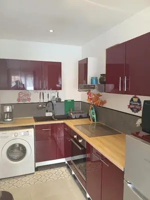 Cuisine ou kitchenette dans l'établissement Appartement cosy proche Paris