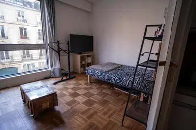 Un ou plusieurs lits dans un hébergement de l'établissement Modern accommodation near Parisian attractions