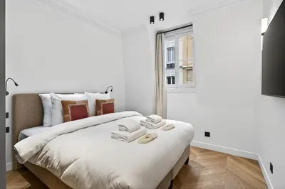 Un ou plusieurs lits dans un hébergement de l'établissement Villa élégante, Champs-Élysées, Opéra-Monceau, AC