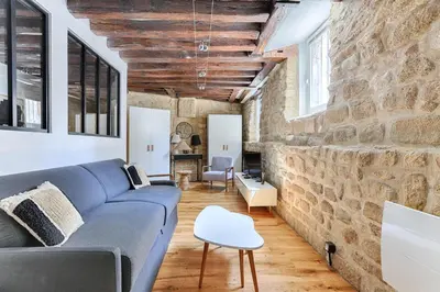Coin salon dans l'établissement Parisian Atypic Apartment close to place Bastille