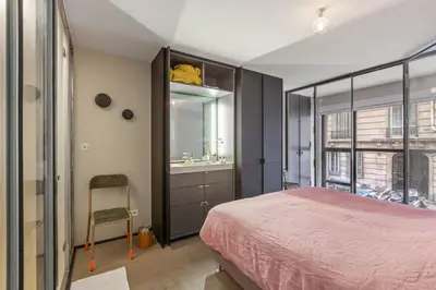 Un ou plusieurs lits dans un hébergement de l'établissement GuestReady - Gorgeous Duplex in Central Paris